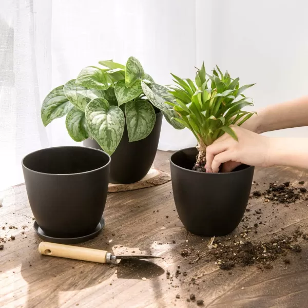 Mkono 65quot Plastic Planters with Saucers Indoor Set of 5 Flower Plant Pots with Drainage for All House Plants Herbs Foliage Plant and Seeding Nursery Cream WhiteBlack
