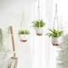 imageMkono Hanging Planters Macrame Plant Hangers with Self Watering Plant Pots Indoor Set of 3 Hanging Baskets Flower Pot Holders with Hooks No Tassels 3 Different Size for Boho Home DecorIvory