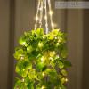 imageMkono Fake Hanging Plant with Lights Artificial Plants for Home Decor Indoor Macrame Plant Hanger with Fake Vines Greenery for Bedroom Bathroom Kitchen Office Decor