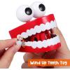 imageChattering Teeth Wind up Toy Walking Teeth Toy with LED Eyes Funny Fake Teeth Clockwork Toy Dentures Joke Toys Party Favors