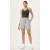 imageODODOS Seamless Padded Sports Bra for Women CrissCross Back Longline Wirefree Brami Ribbed Crop Tank TopsBlack