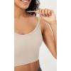 imageODODOS Seamless Racerback Sports Bra for Women Ribbed Camisoles Non Padding Yoga Bra Crop Tank TopsIvorystar Whiteermine