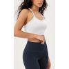 imageODODOS Seamless Racerback Sports Bra for Women Ribbed Camisoles Non Padding Yoga Bra Crop Tank TopsWhite