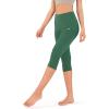 imageODODOS Womens High Waisted Yoga Capris with Pockets Tummy Control Non See Through Workout Athletic Running Capri LeggingsDark Green