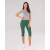 imageODODOS Womens High Waisted Yoga Capris with Pockets Tummy Control Non See Through Workout Athletic Running Capri LeggingsDark Green