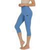 imageODODOS Womens High Waisted Yoga Capris with Pockets Tummy Control Non See Through Workout Athletic Running Capri LeggingsDream Blue