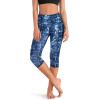 imageODODOS Womens High Waisted Yoga Capris with Pockets Tummy Control Non See Through Workout Athletic Running Capri LeggingsIndigo
