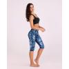 imageODODOS Womens High Waisted Yoga Capris with Pockets Tummy Control Non See Through Workout Athletic Running Capri LeggingsIndigo