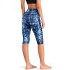 imageODODOS Womens High Waisted Yoga Capris with Pockets Tummy Control Non See Through Workout Athletic Running Capri LeggingsIndigo