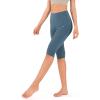 imageODODOS Womens High Waisted Yoga Capris with Pockets Tummy Control Non See Through Workout Athletic Running Capri LeggingsInk Blue