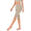 imageODODOS Womens High Waisted Yoga Capris with Pockets Tummy Control Non See Through Workout Athletic Running Capri LeggingsShaker Beige