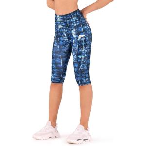 imageODODOS Womens High Waisted Yoga Capris with Pockets Tummy Control Non See Through Workout Athletic Running Capri LeggingsIndigo