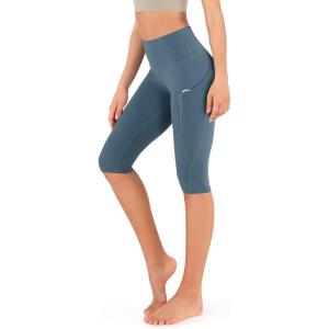 imageODODOS Womens High Waisted Yoga Capris with Pockets Tummy Control Non See Through Workout Athletic Running Capri LeggingsInk Blue