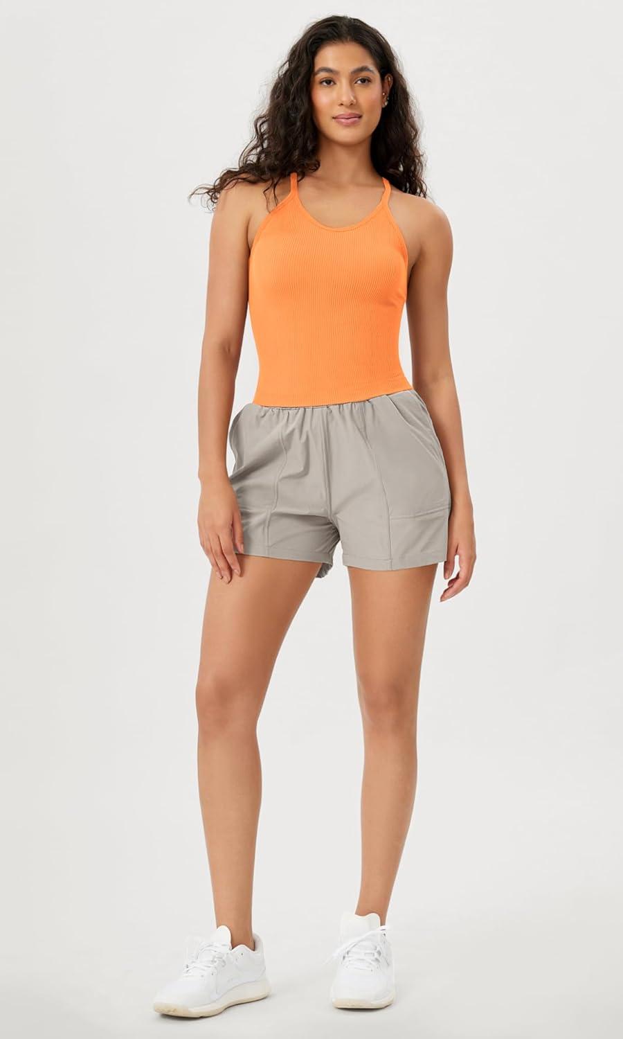 imageODODOS Womens Crop Seamless RibKnit Camisole Strappy Racerback Cropped Tank TopsNeon Orange