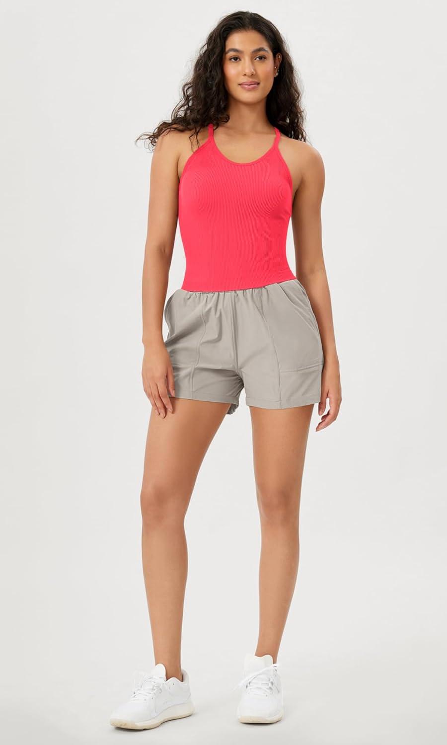 imageODODOS Womens Crop Seamless RibKnit Camisole Strappy Racerback Cropped Tank TopsNeon Pink