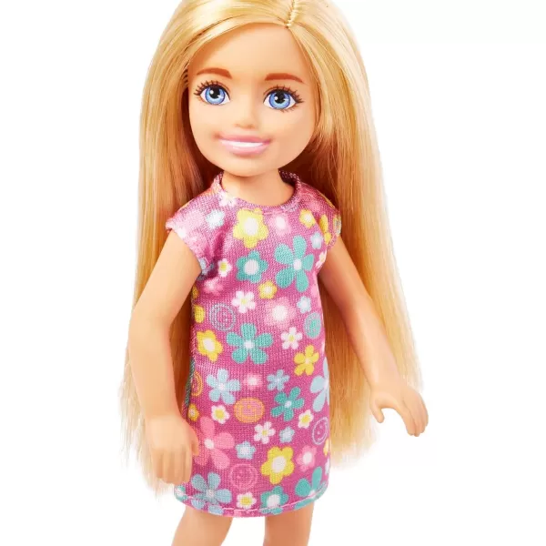 Barbie Chelsea Doll Small Boy Doll with Brown Hair amp Blue Eyes Wearing Gummy Bear TShirt Shorts amp ShoesBlonde Flower Dress