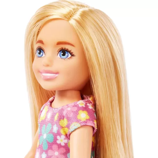 Barbie Chelsea Doll Small Boy Doll with Brown Hair amp Blue Eyes Wearing Gummy Bear TShirt Shorts amp ShoesBlonde Flower Dress