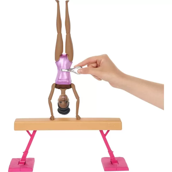 Barbie Gymnastics Playset with Doll and 15 Accessories Twirling Gymnast Toy with Balance Beam Brunette DollBarbie Gymnastics Playset with Doll and 15 Accessories Twirling Gymnast Toy with Balance Beam Brunette Doll