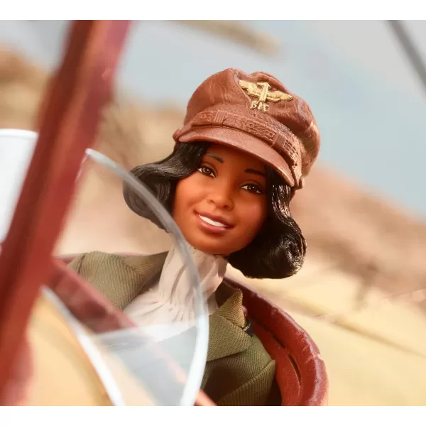 Barbie Inspiring Women Doll Bessie Coleman Collectible Dressed in Aviator Suit with Helmet and GogglesBarbie Inspiring Women Doll Bessie Coleman Collectible Dressed in Aviator Suit with Helmet and Goggles