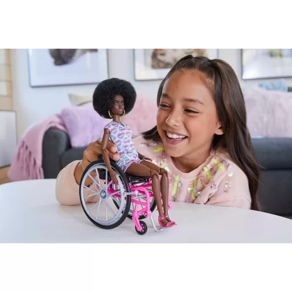 Barbie Ken Fashionistas Doll 167 with Wheelchair and Ramp Wearing TieDye Shirt Black Shorts and Accessories Amazon ExclusiveRainbow Hearts