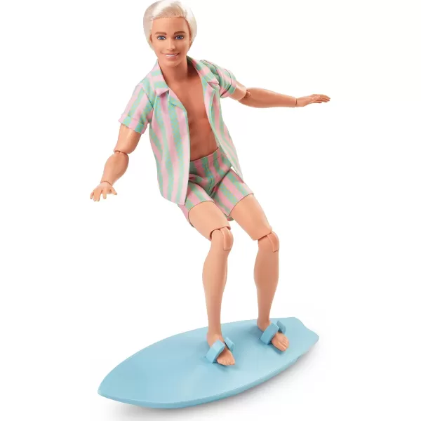 Barbie The Movie Ken Doll Wearing Pastel Pink and Green Striped Beach Matching Set with Surfboard and White SneakersBarbie The Movie Ken Doll Wearing Pastel Pink and Green Striped Beach Matching Set with Surfboard and White Sneakers