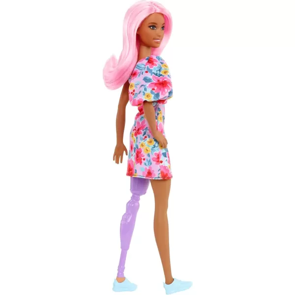 imageBarbie Fashionistas Doll 189 with Pink Hair ampamp Prosthetic Leg Wearing Floral Dress ampamp Accessories Including Sneakers ampamp Sunglasses