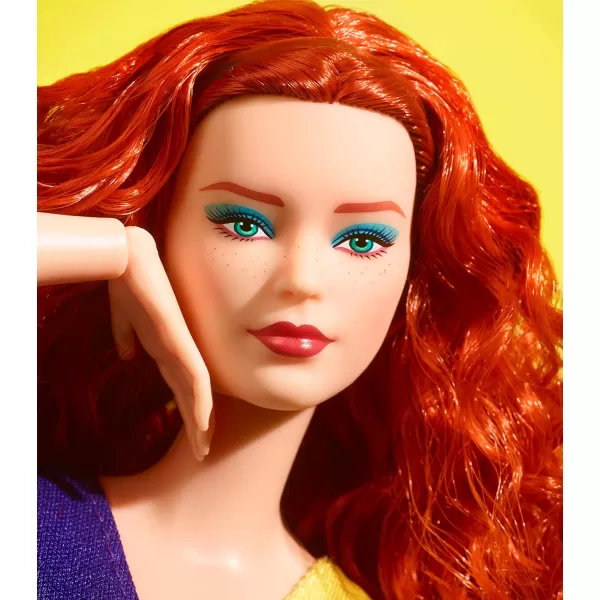 imageBarbie Looks Fashion Doll with Curly Red Hair Wearing Color Block Top ampamp Glossy Pleather Skirt Collectible with Posable Made to Move Body