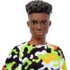 imageBarbie Fashionistas Ken Doll 123 Broad with Black Curly Hair Wearing MultiColored Camo Print Shirt Neon Green Shorts ampamp Silvery Sneakers