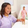 imageBarbie Fashionistas Ken Doll 235 with Braided Brown Hair Wearing Coral Jumpsuit with Hawaiian Print and Green Sandals