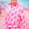 imageBarbie The Movie Ken Collectible Doll Ryan Gosling as Ken Wearing Pink Jumpsuit with B Detail with White Sneakers and Multicolor Roller Skates
