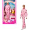 imageBarbie The Movie Ken Collectible Doll Ryan Gosling as Ken Wearing Pink Jumpsuit with B Detail with White Sneakers and Multicolor Roller Skates