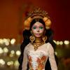 imageBarbie Signature Doll Da De Muertos 2025 Collectible in Ruffled Cream Gown Trimmed with Marigolds and Ribbon Flower Crown and Calavera Face Paint