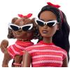 imageBarbie Twinning Looks Doll with Pet Dog in Matching Red Striped Clothes and Accessories for Both like Sunglasses and Headbands Wavy Black HairRed Stripes