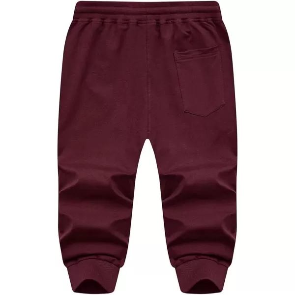 MAGNIVIT Mens 34 Jogger Capri Pants Workout Gym Below Knee Shorts Zipper PocketsBurgundy