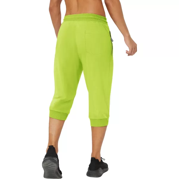 imageMAGNIVIT Mens 34 Jogger Capri Pants Workout Gym Below Knee Shorts Zipper Pockets Jogger Sweatpant Capris for MenFluorescent Green