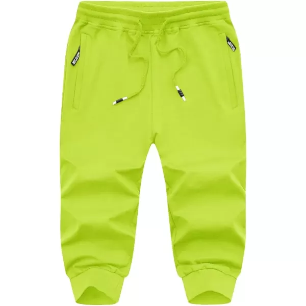 imageMAGNIVIT Mens 34 Jogger Capri Pants Workout Gym Below Knee Shorts Zipper Pockets Jogger Sweatpant Capris for MenFluorescent Green