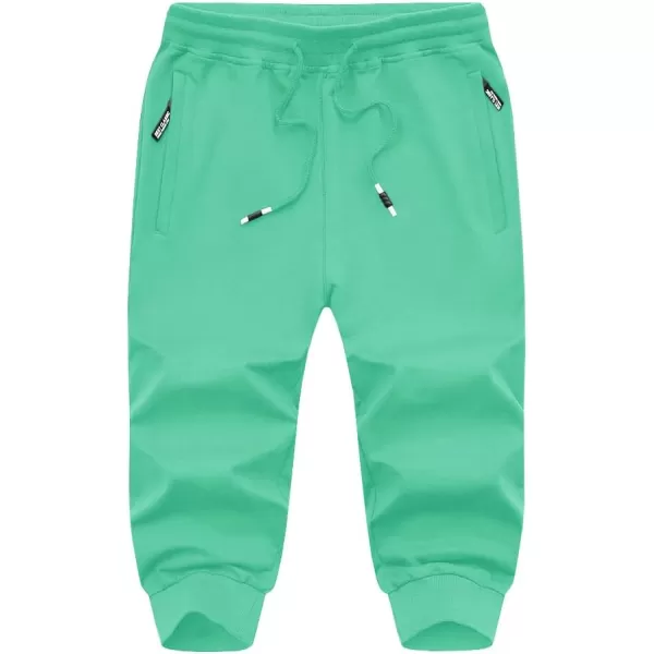 imageMAGNIVIT Mens 34 Jogger Capri Pants Workout Gym Below Knee Shorts Zipper Pockets Jogger Sweatpant Capris for MenMint Green