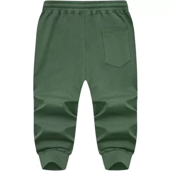 imageMAGNIVIT Mens 34 Jogger Capri Pants Workout Gym Below Knee Shorts Zipper Pockets Jogger Sweatpant Capris for MenPea Green