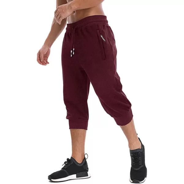 imageMAGNIVIT Mens 34 Jogger Capri Pants Workout Gym Below Knee Shorts Zipper Pockets Jogger Sweatpant Capris for MenBurgundy