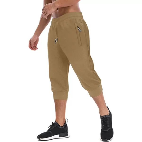 imageMAGNIVIT Mens 34 Jogger Capri Pants Workout Gym Below Knee Shorts Zipper Pockets Jogger Sweatpant Capris for MenKhaki