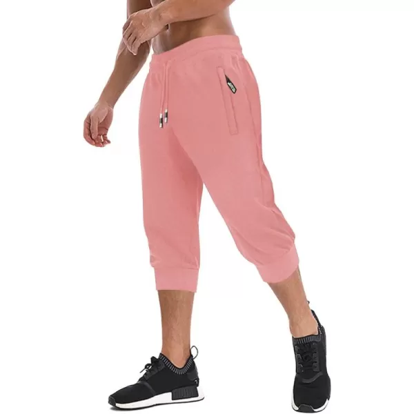 imageMAGNIVIT Mens 34 Jogger Capri Pants Workout Gym Below Knee Shorts Zipper Pockets Jogger Sweatpant Capris for MenLight Pink