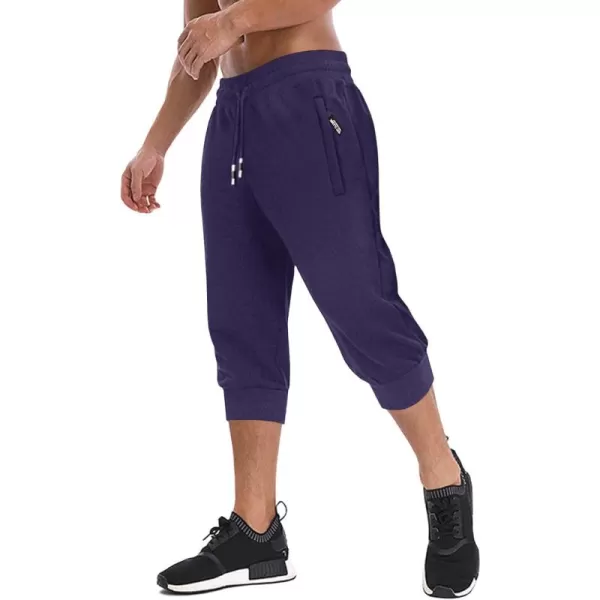 imageMAGNIVIT Mens 34 Jogger Capri Pants Workout Gym Below Knee Shorts Zipper Pockets Jogger Sweatpant Capris for MenMedium Purple